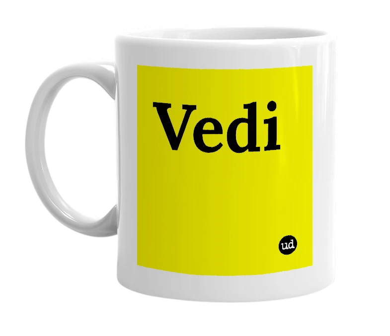 White mug with 'Vedi' in bold black letters