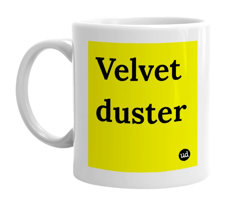 White mug with 'Velvet duster' in bold black letters
