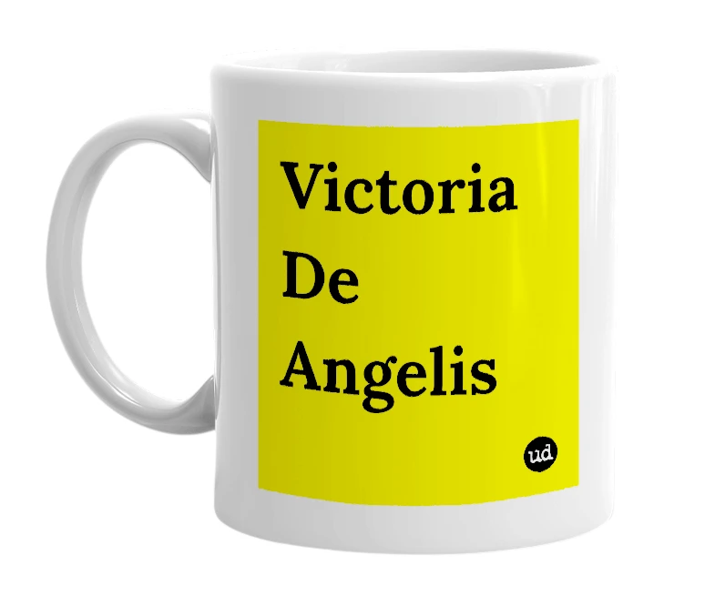White mug with 'Victoria De Angelis' in bold black letters