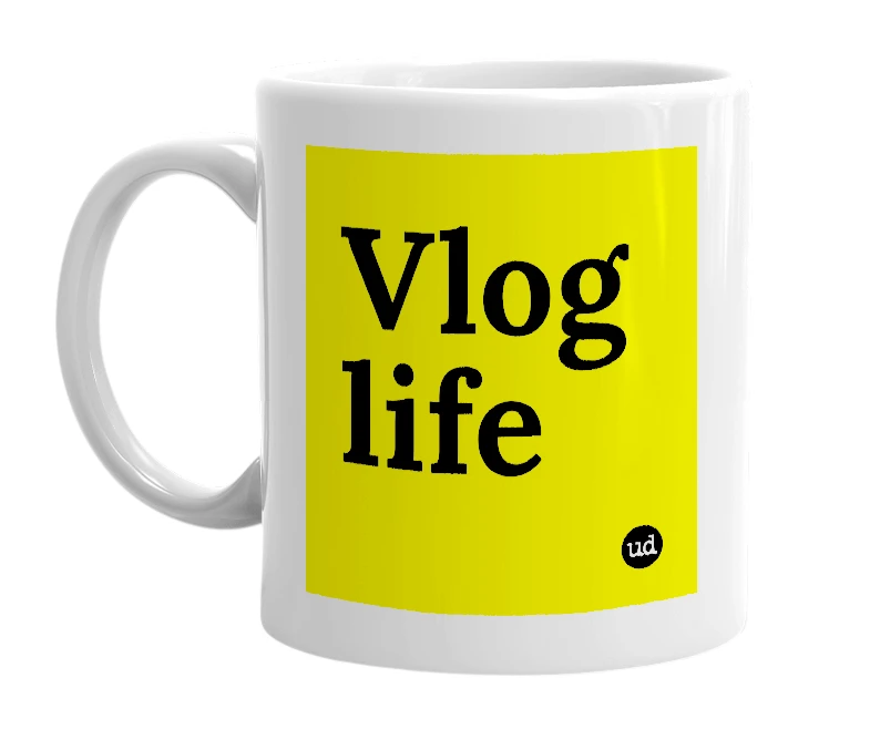 White mug with 'Vlog life' in bold black letters