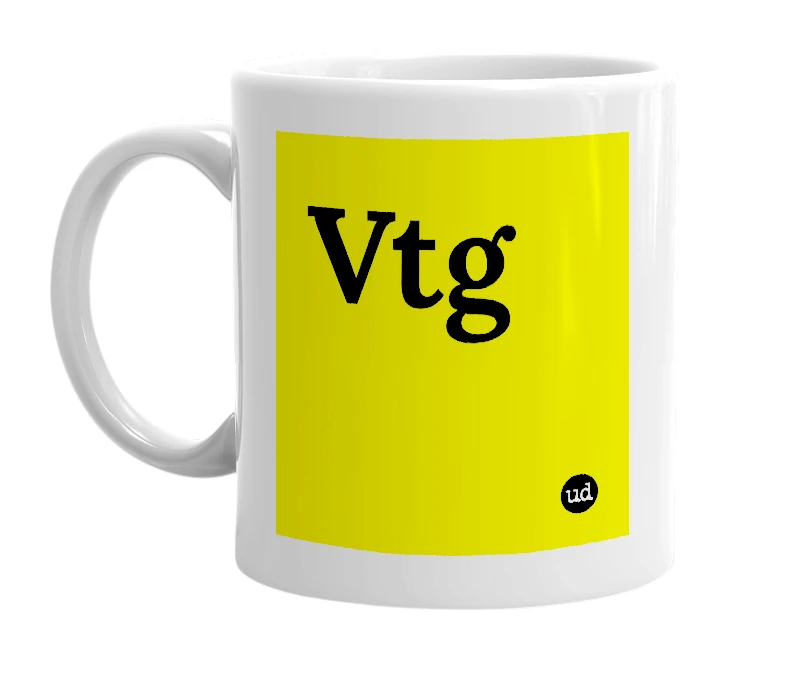 White mug with 'Vtg' in bold black letters