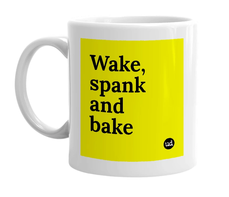White mug with 'Wake, spank and bake' in bold black letters