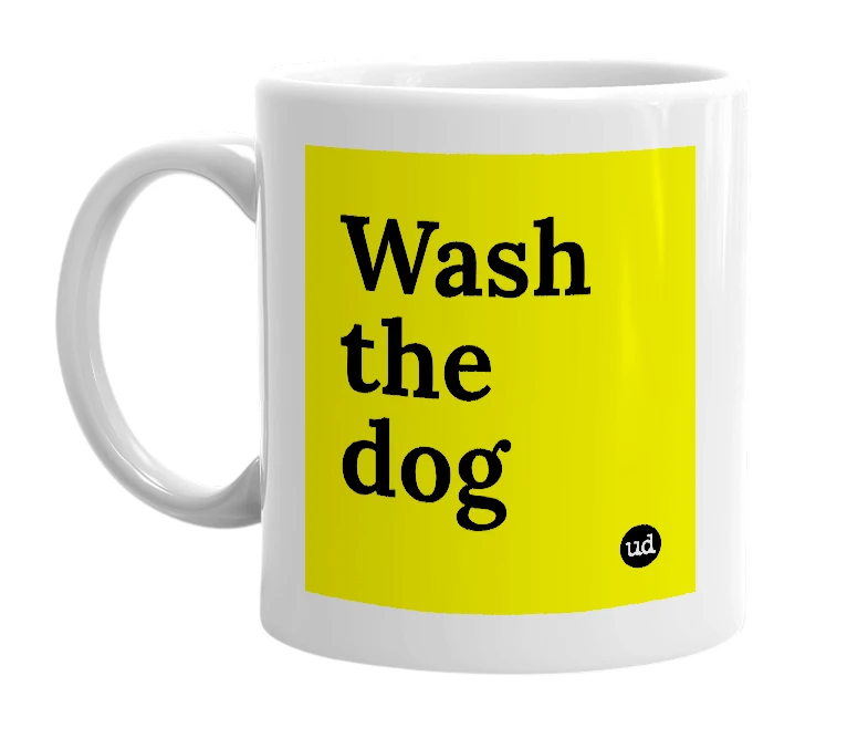 White mug with 'Wash the dog' in bold black letters