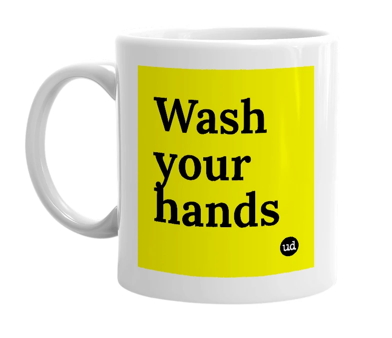 White mug with 'Wash your hands' in bold black letters