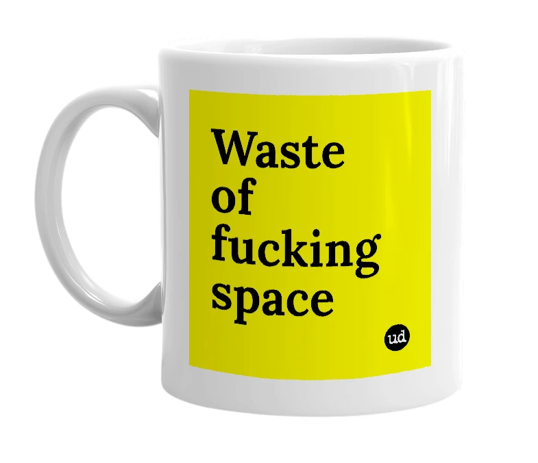 White mug with 'Waste of fucking space' in bold black letters