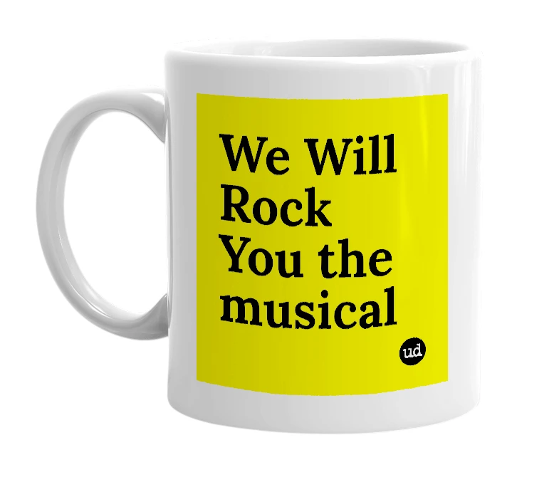 White mug with 'We Will Rock You the musical' in bold black letters