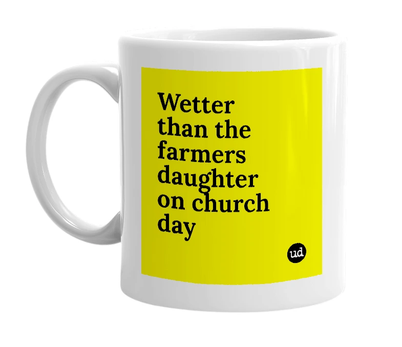 White mug with 'Wetter than the farmers daughter on church day' in bold black letters