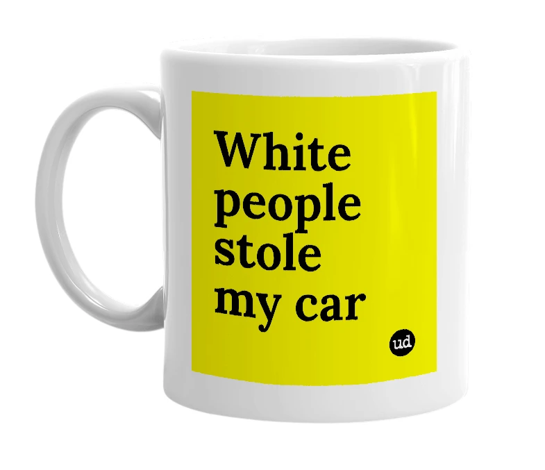 White mug with 'White people stole my car' in bold black letters
