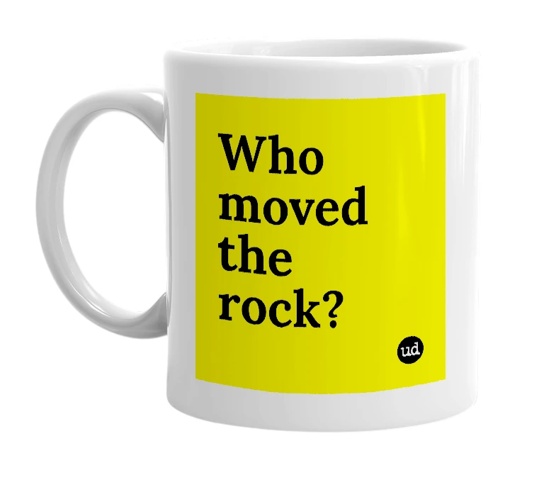 White mug with 'Who moved the rock?' in bold black letters