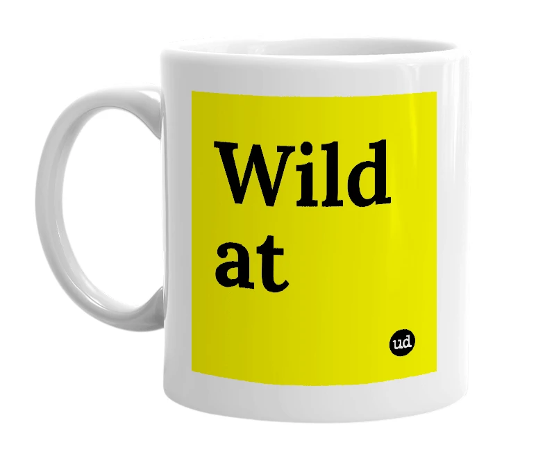 White mug with 'Wild at' in bold black letters