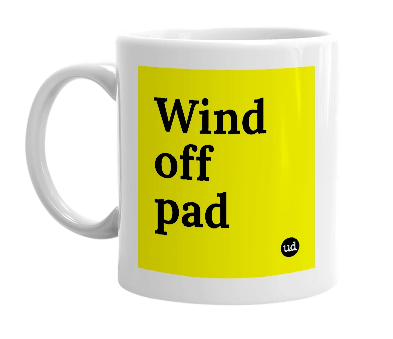 White mug with 'Wind off pad' in bold black letters
