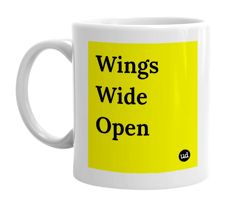 White mug with 'Wings Wide Open' in bold black letters