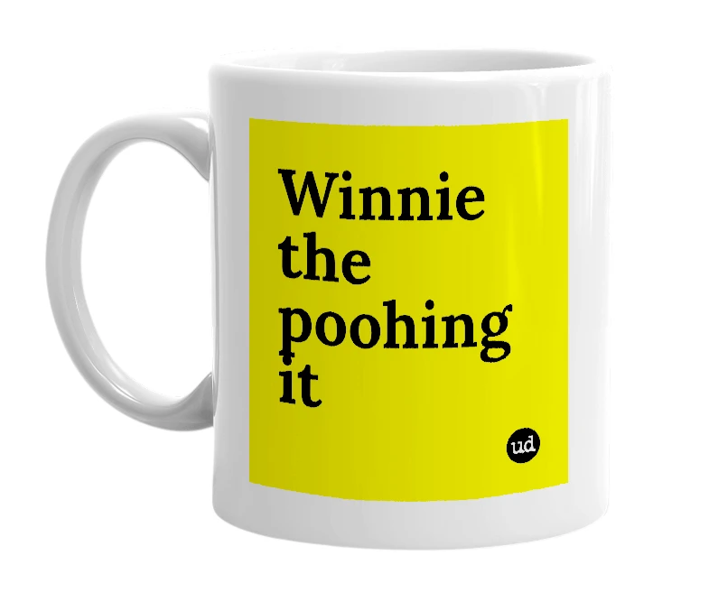 White mug with 'Winnie the poohing it' in bold black letters