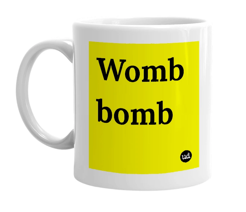 White mug with 'Womb bomb' in bold black letters