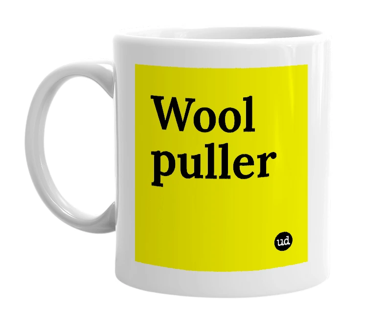 White mug with 'Wool puller' in bold black letters