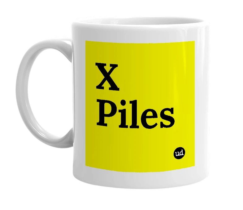 White mug with 'X Piles' in bold black letters