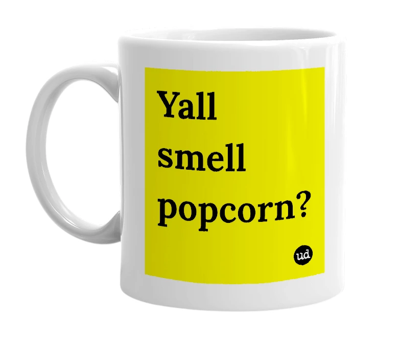 White mug with 'Yall smell popcorn?' in bold black letters
