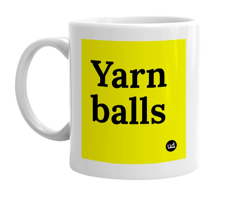 White mug with 'Yarn balls' in bold black letters