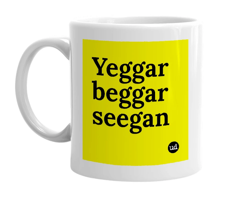 White mug with 'Yeggar beggar seegan' in bold black letters