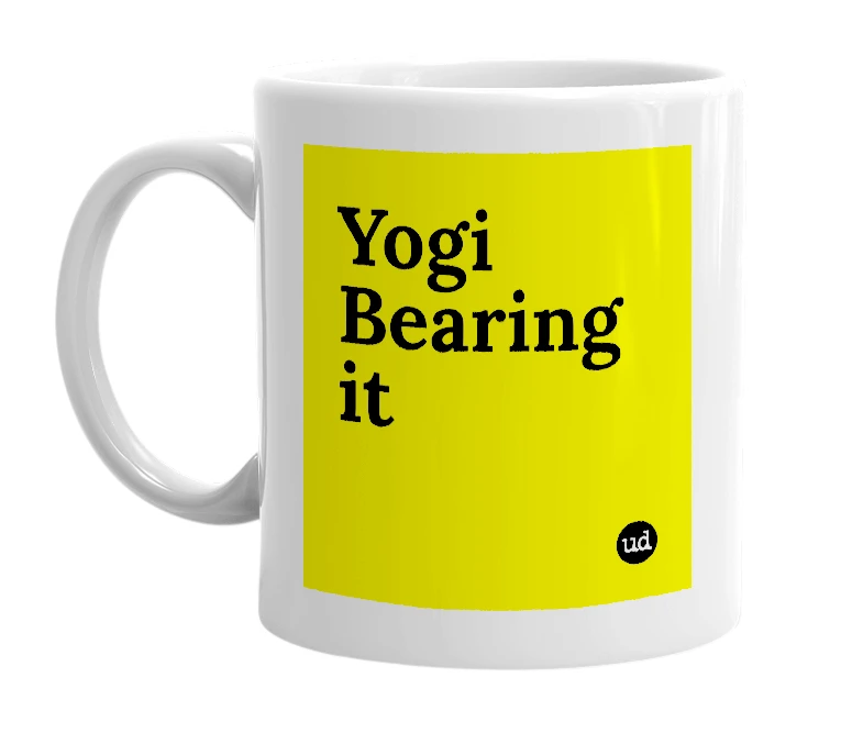 White mug with 'Yogi Bearing it' in bold black letters