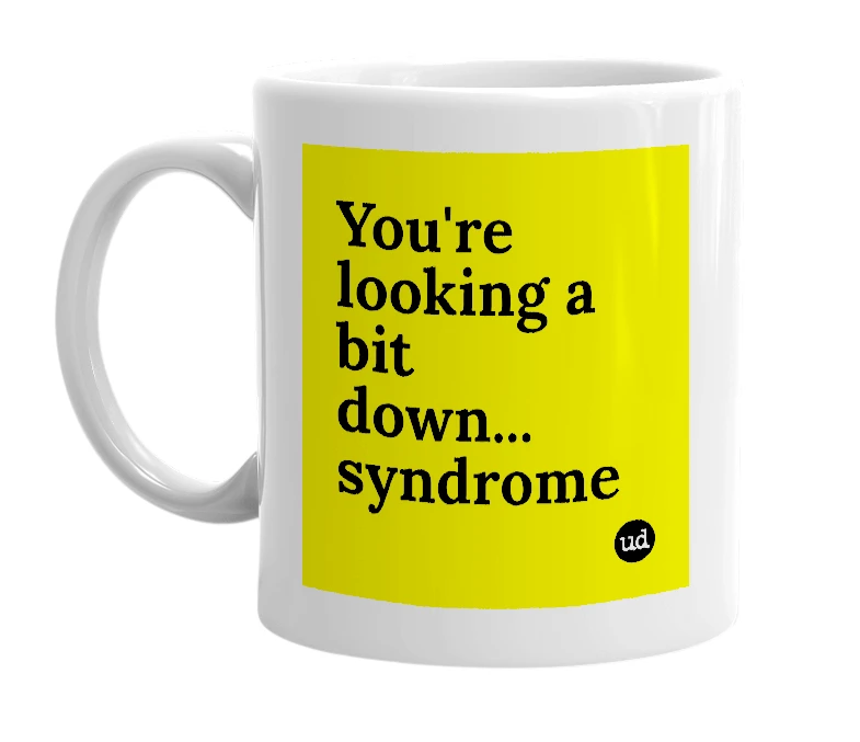 White mug with 'You're looking a bit down... syndrome' in bold black letters