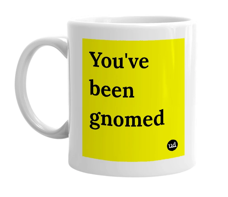 White mug with 'You've been gnomed' in bold black letters