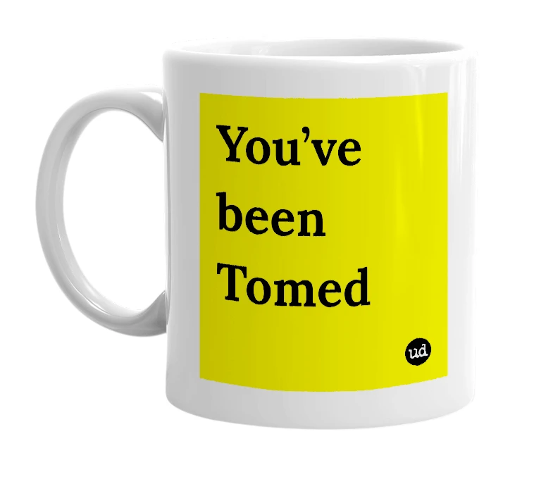 White mug with 'You’ve been Tomed' in bold black letters