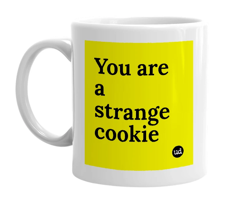 White mug with 'You are a strange cookie' in bold black letters