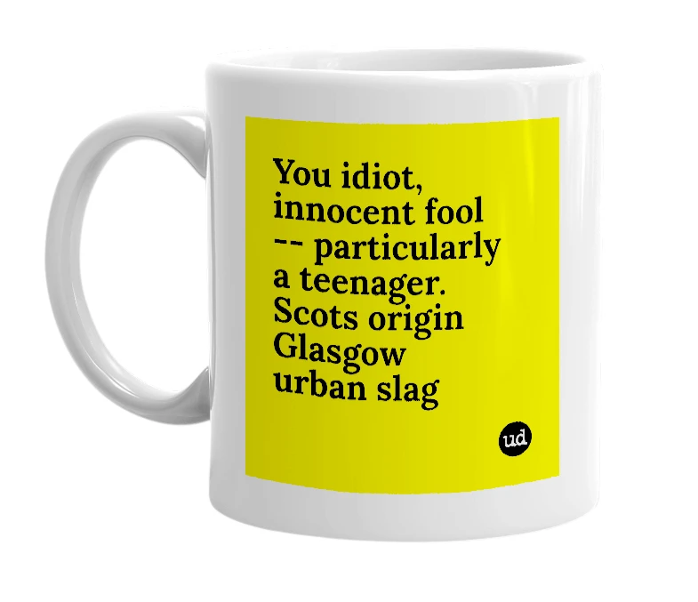 White mug with 'You idiot, innocent fool -- particularly a teenager. Scots origin Glasgow urban slag' in bold black letters