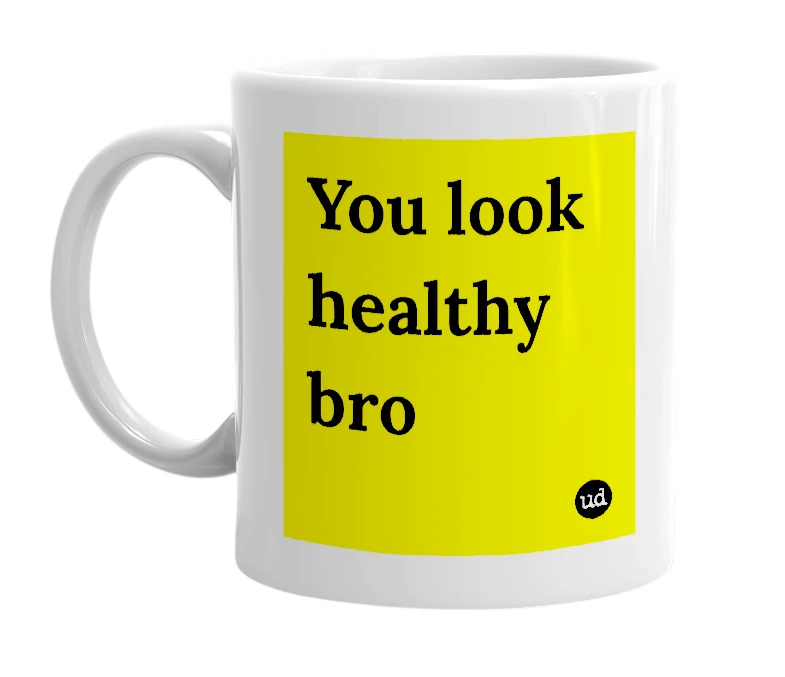 White mug with 'You look healthy bro' in bold black letters