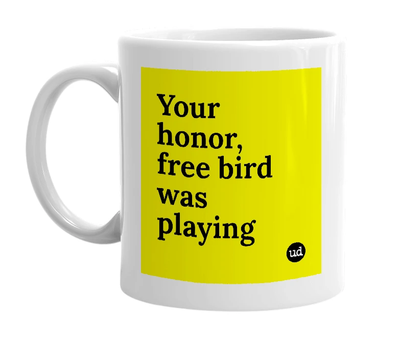 White mug with 'Your honor, free bird was playing' in bold black letters