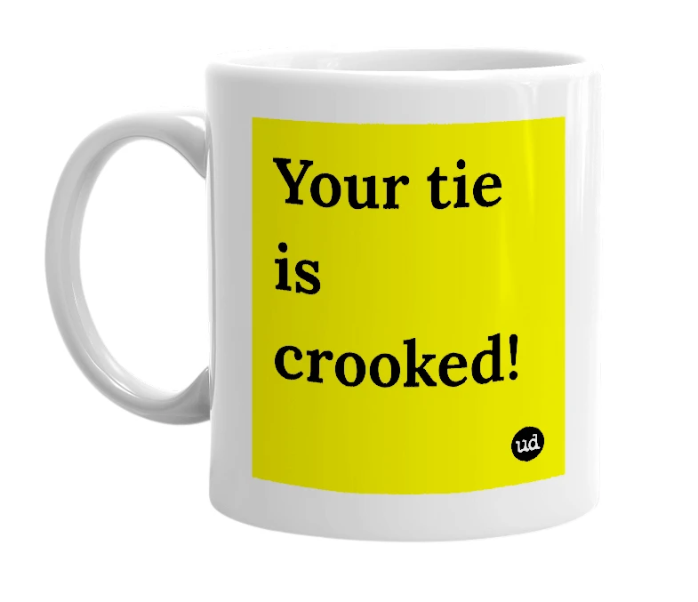 White mug with 'Your tie is crooked!' in bold black letters