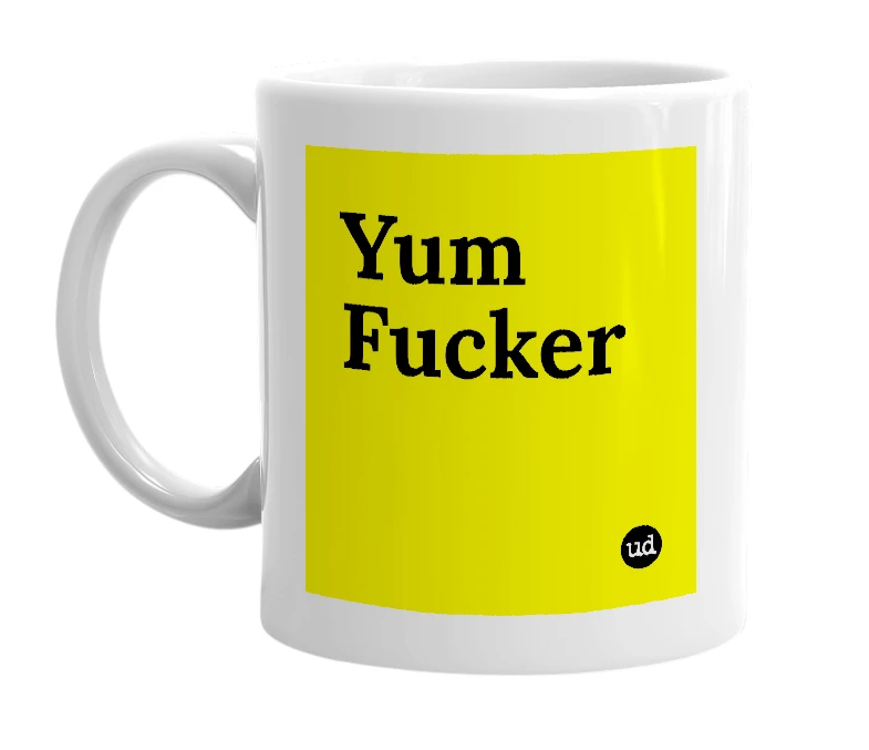 White mug with 'Yum Fucker' in bold black letters