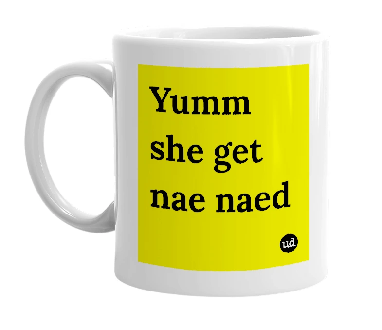 White mug with 'Yumm she get nae naed' in bold black letters