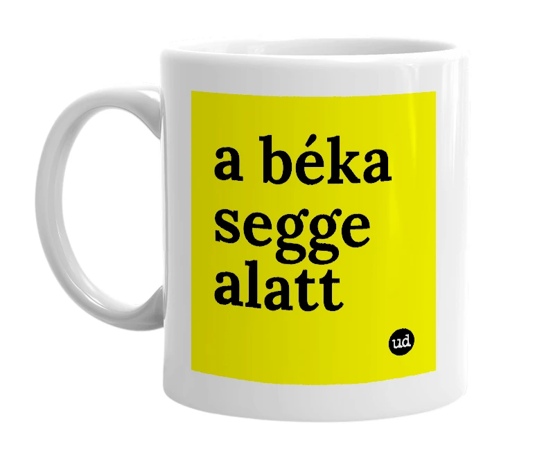 White mug with 'a béka segge alatt' in bold black letters
