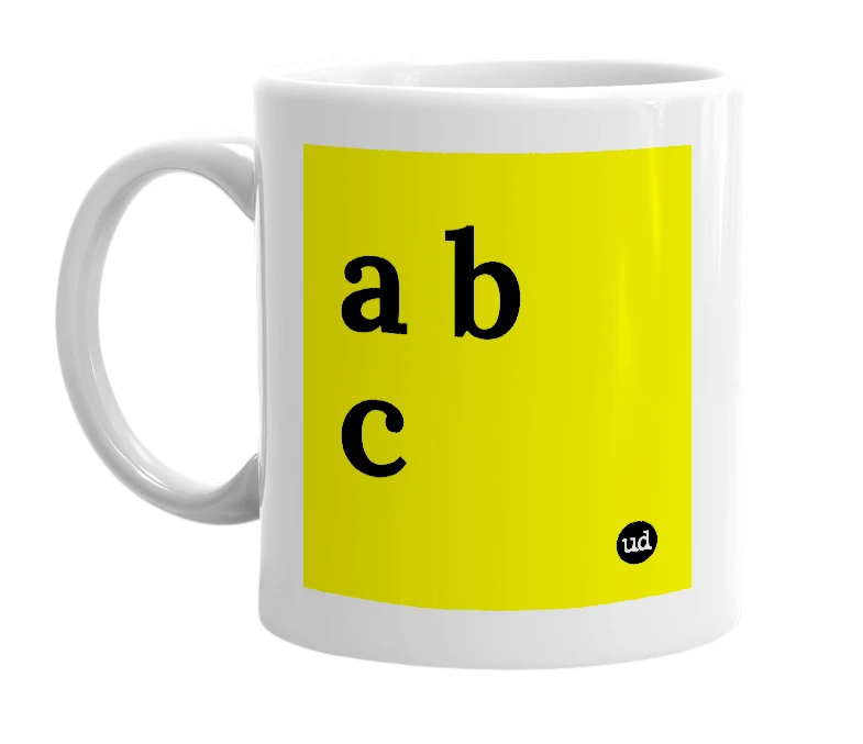 White mug with 'a b c' in bold black letters