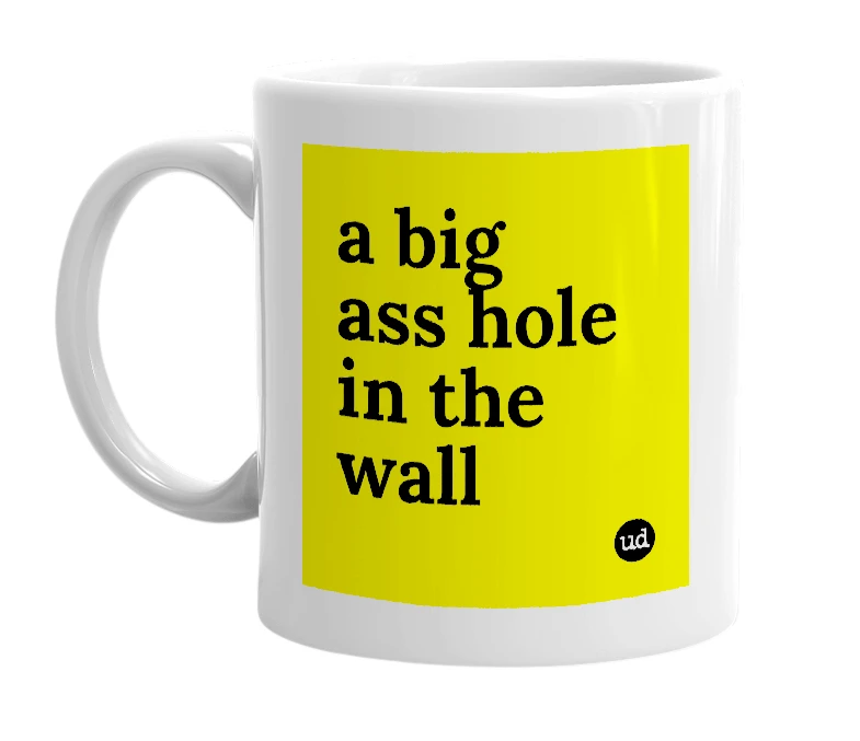 White mug with 'a big ass hole in the wall' in bold black letters