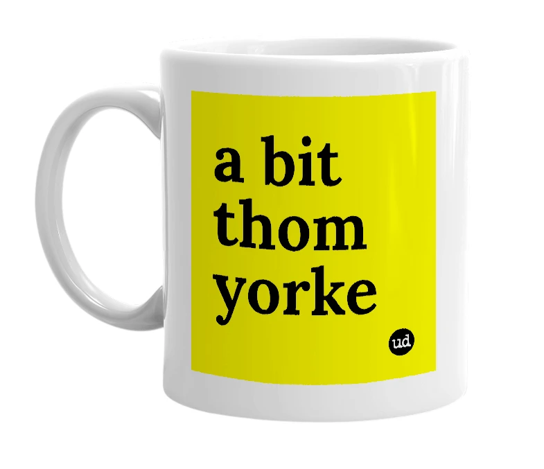 White mug with 'a bit thom yorke' in bold black letters