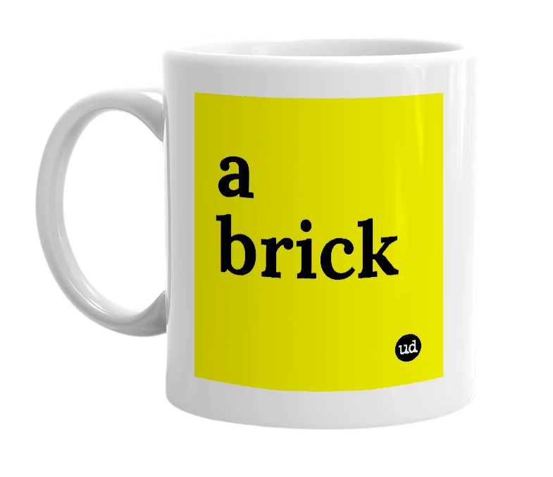 White mug with 'a brick' in bold black letters