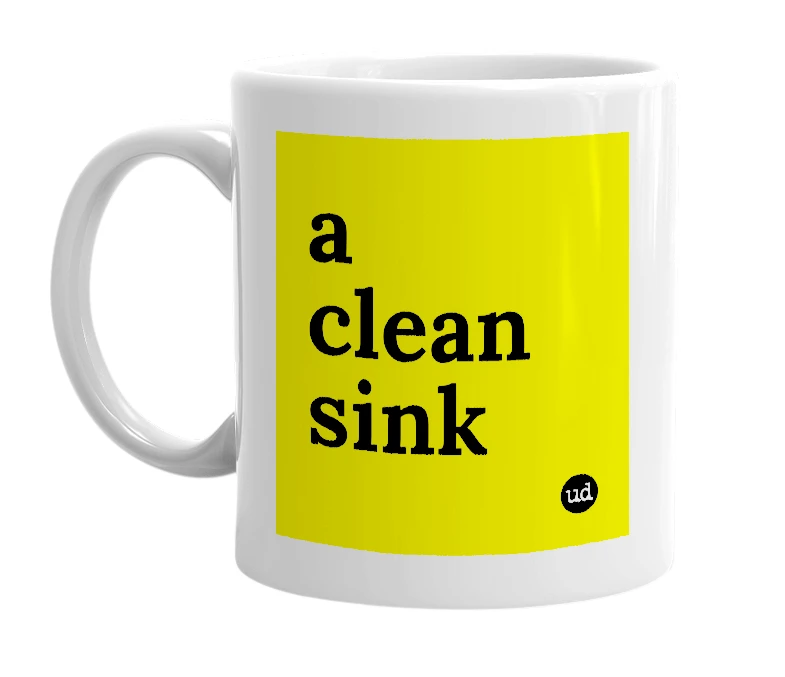 White mug with 'a clean sink' in bold black letters