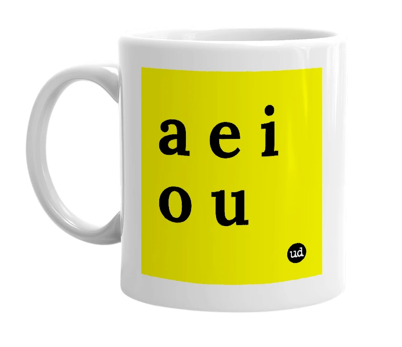 White mug with 'a e i o u' in bold black letters
