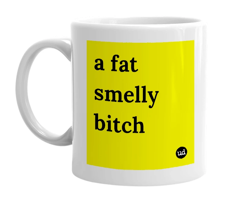 White mug with 'a fat smelly bitch' in bold black letters