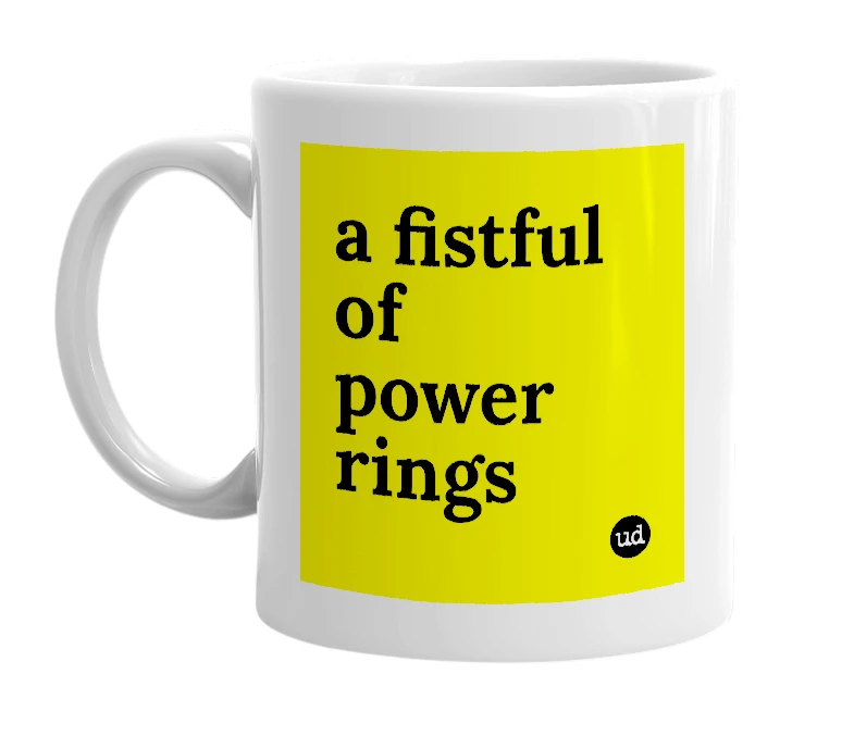 White mug with 'a fistful of power rings' in bold black letters