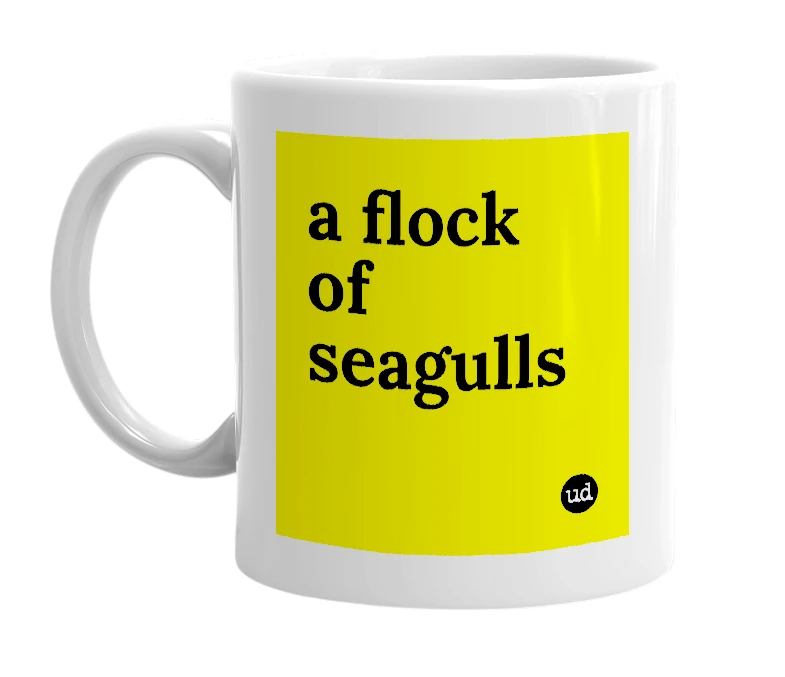 White mug with 'a flock of seagulls' in bold black letters