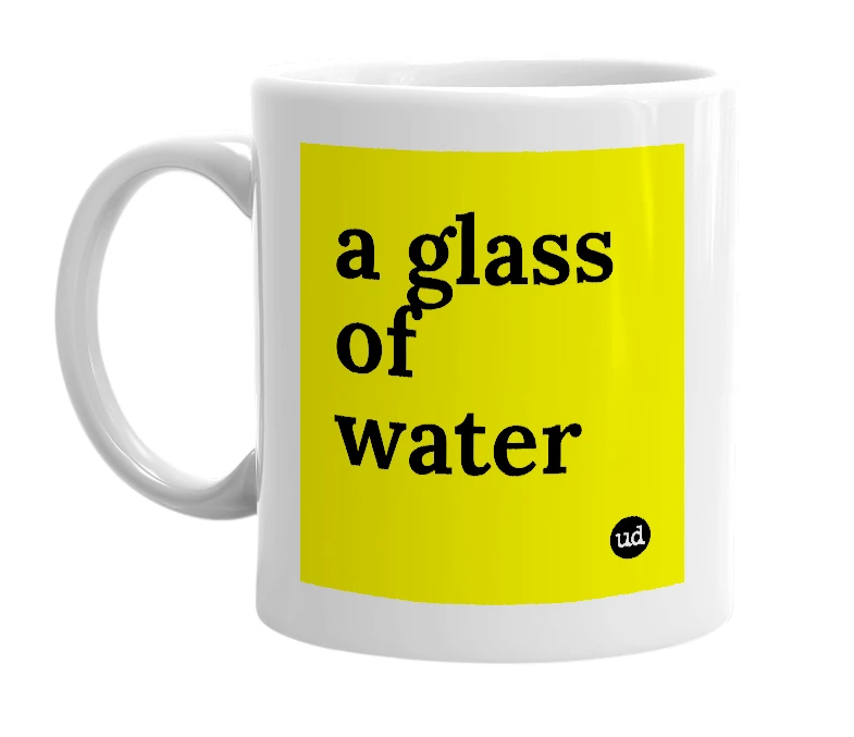 White mug with 'a glass of water' in bold black letters
