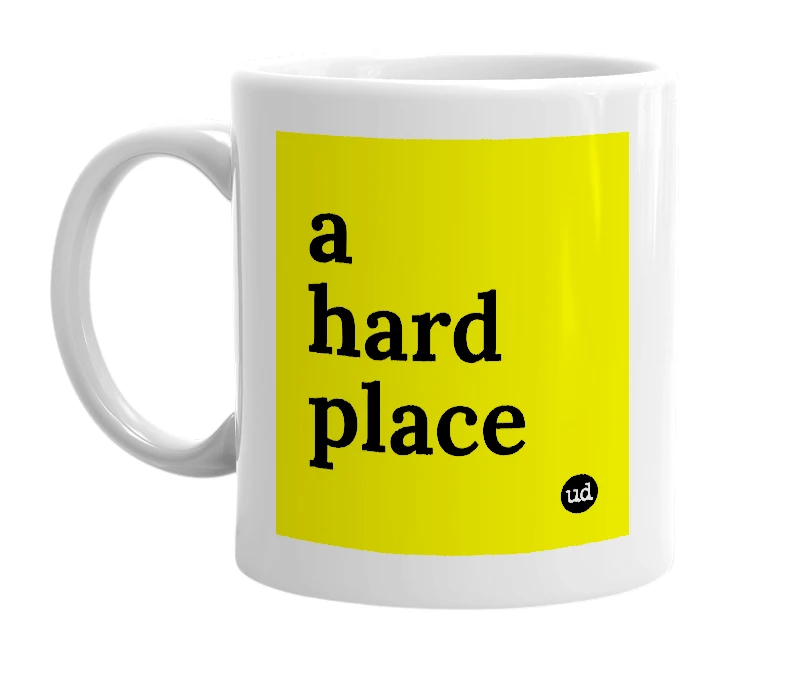 White mug with 'a hard place' in bold black letters