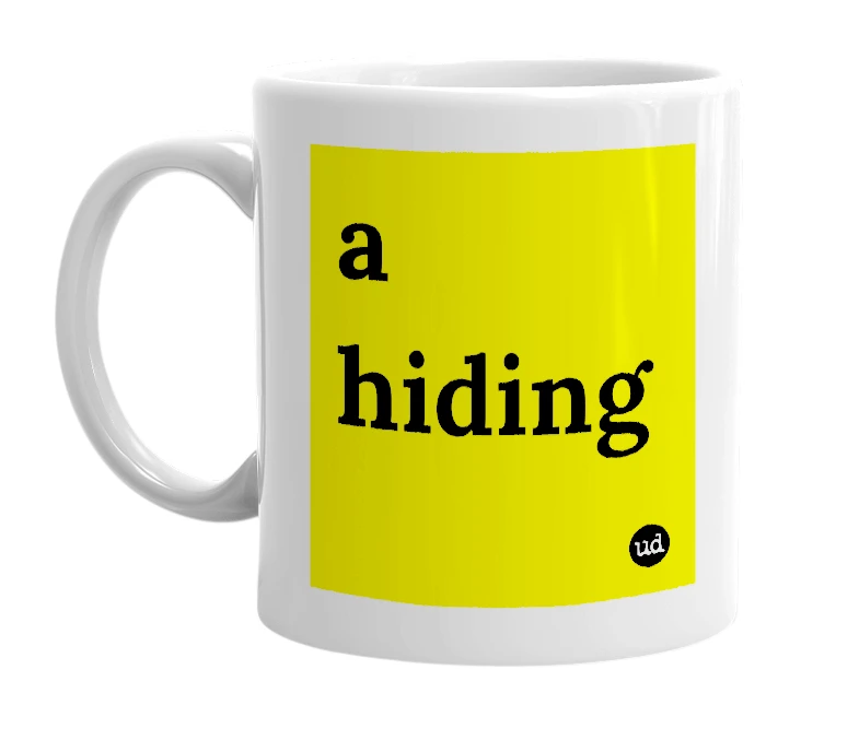 White mug with 'a hiding' in bold black letters