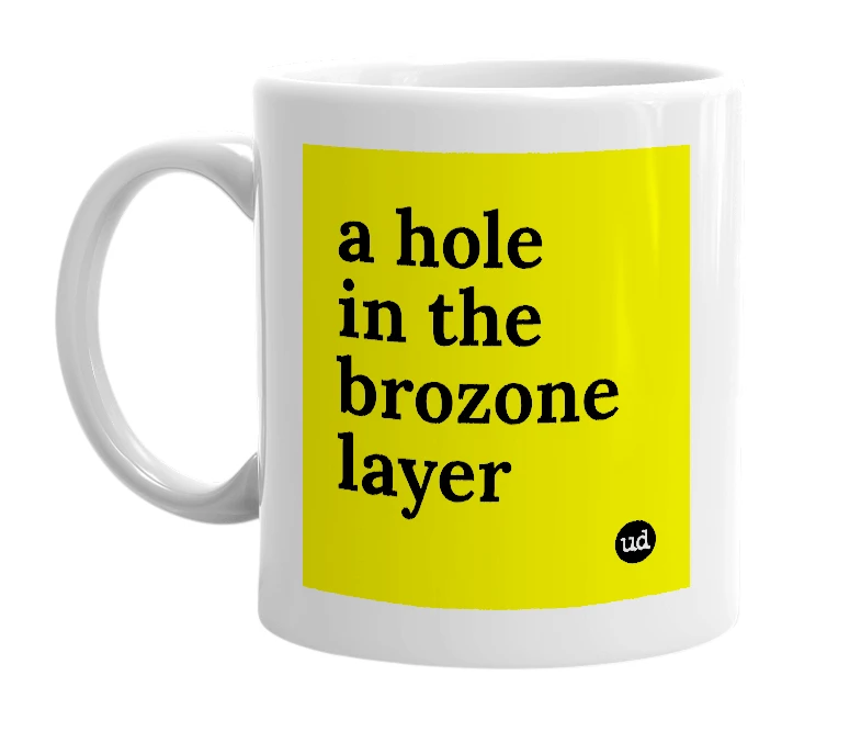 White mug with 'a hole in the brozone layer' in bold black letters