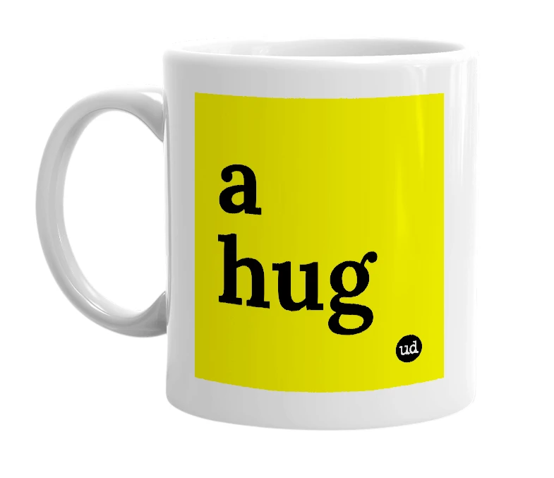 White mug with 'a hug' in bold black letters