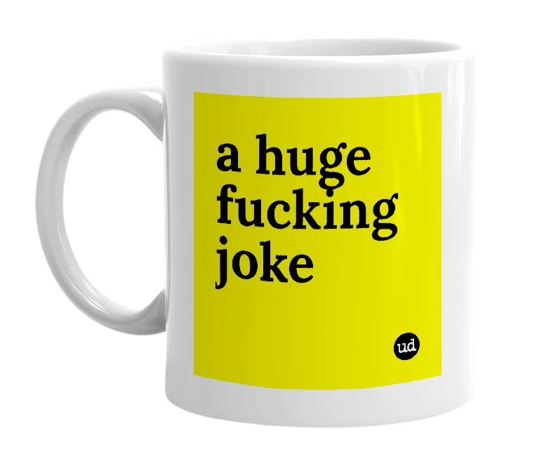 White mug with 'a huge fucking joke' in bold black letters
